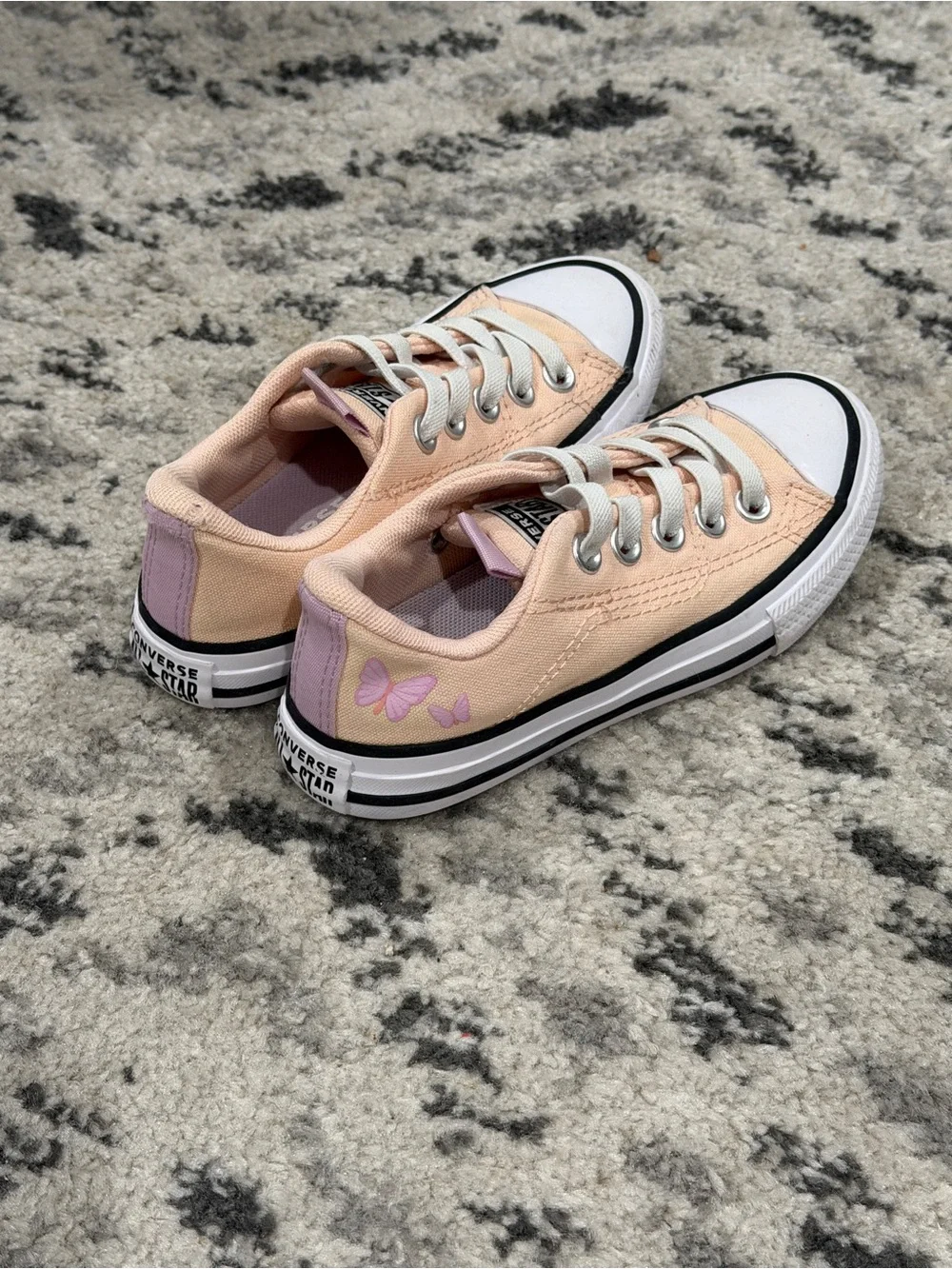 Converse Low Top Sneakers in Peach with Lilac Butterfly Detail
